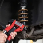 Car Spring Compressor Tool in Action