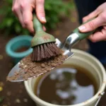 Cleaning Garden Tools with Brush and Water