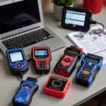 Different types of car diagnostic tools displayed on a workbench