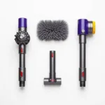 Various Dyson car cleaning attachments including crevice tool, brush, and extension hose.