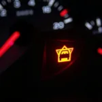 Flashing Check Engine Light on a Car Dashboard