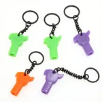 Keychain car window breaker tool in various designs and colors.