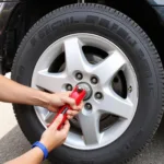 Using a Lug Wrench to Change a Tire