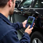 Mechanic using an OBD-II Scanner