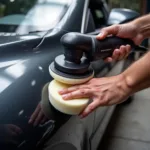 Professional Car Polishing Process: A person is shown using a dual-action polisher on a car panel, demonstrating the correct technique for achieving a flawless finish.