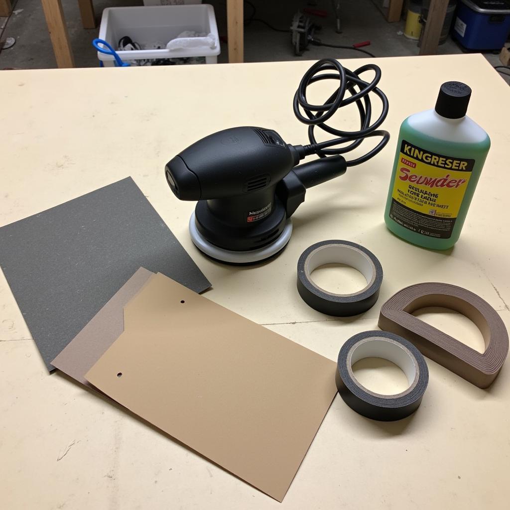 Car Surface Preparation Tools: Sander, Sandpaper, Masking Tape, Degreaser