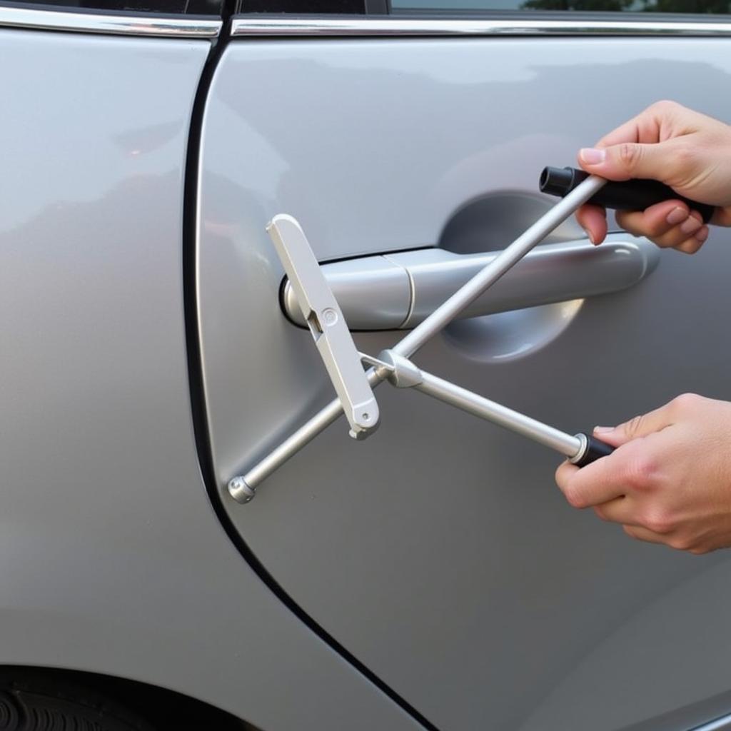 T-Bar Dent Puller in Use on a Car Door