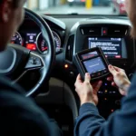 Mechanic using a scan tool to diagnose a check engine light on a used car