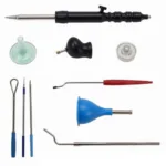 Close-up of a car windshield repair kit, showing the various tools and components included.