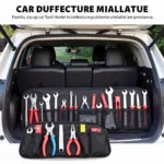 A sturdy zip up tool holder neatly organizing various car tools, including wrenches, screwdrivers, and pliers, inside a car trunk.